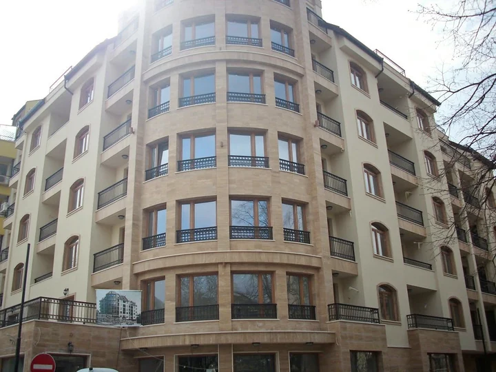 Residential building with tall windows and balconies